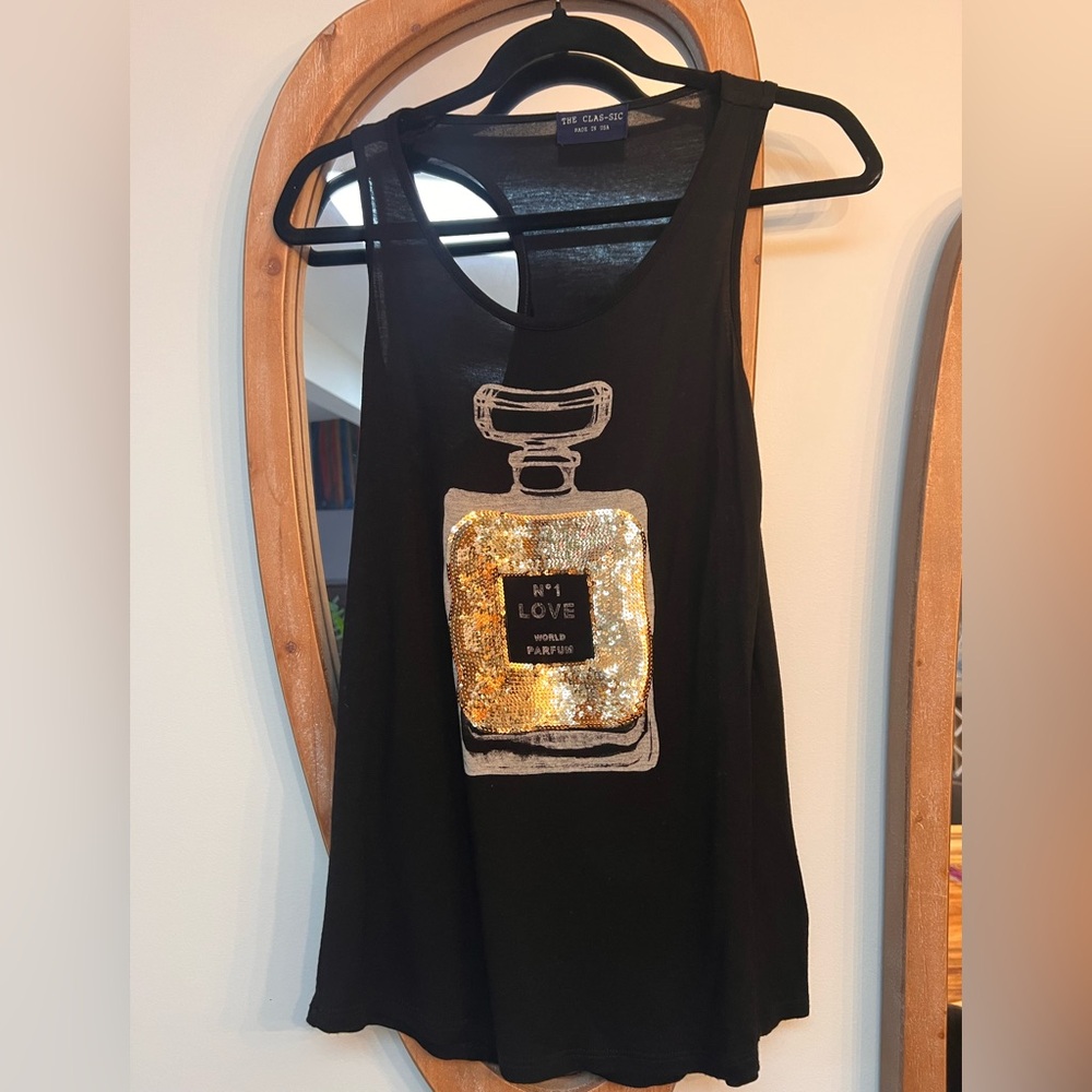 The Clas-sic Black Tank Top with perfume sparkle graphic